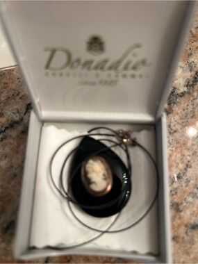 Vintage-Style Black Cameo Pendant Necklace with Gold Accent